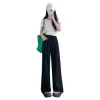 A woman in black wide-leg pants is paired with a white short-sleeved top and a white hat for a real photo of a model Item Picture